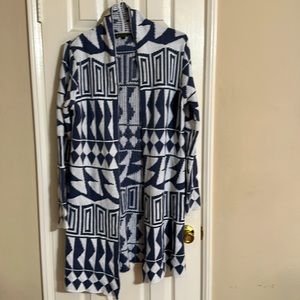 Light blue sweater multi shapes on sweater